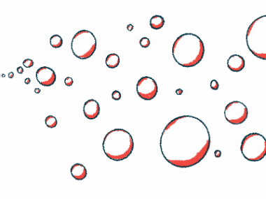 A children blows bubbles that float away.