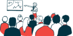 A speaker points to a presentation in front of an audience.