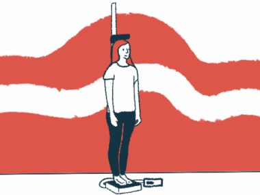 A young woman stands on a scale that measures her height.