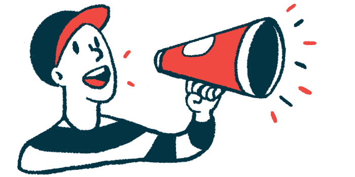 A man wearing a ballcap speaks into a megaphone to get a message out.