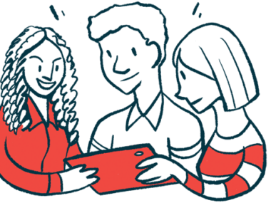 Three people are gathered around a tablet.