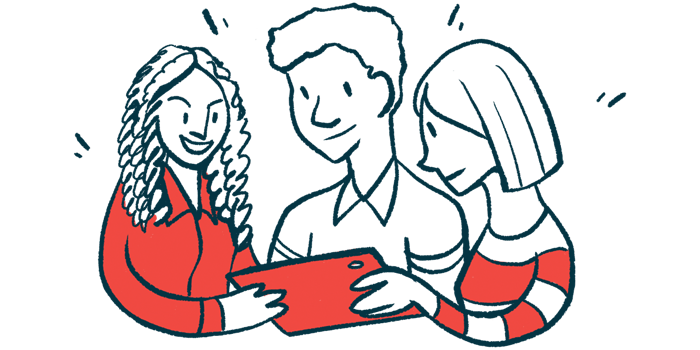 Three people are gathered around a tablet.